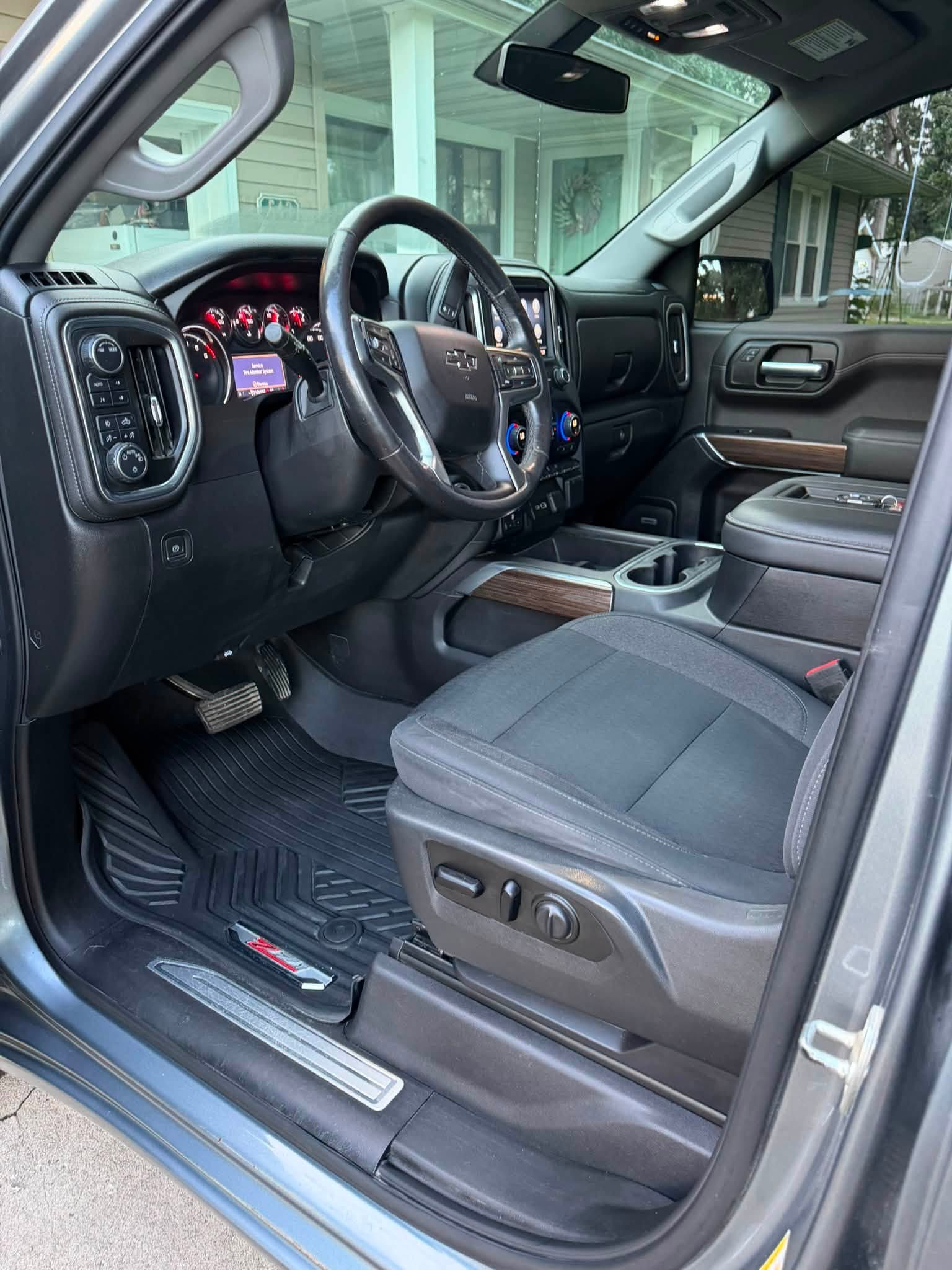 Truck driver area after detailing with clean flooring, dashboard and seating